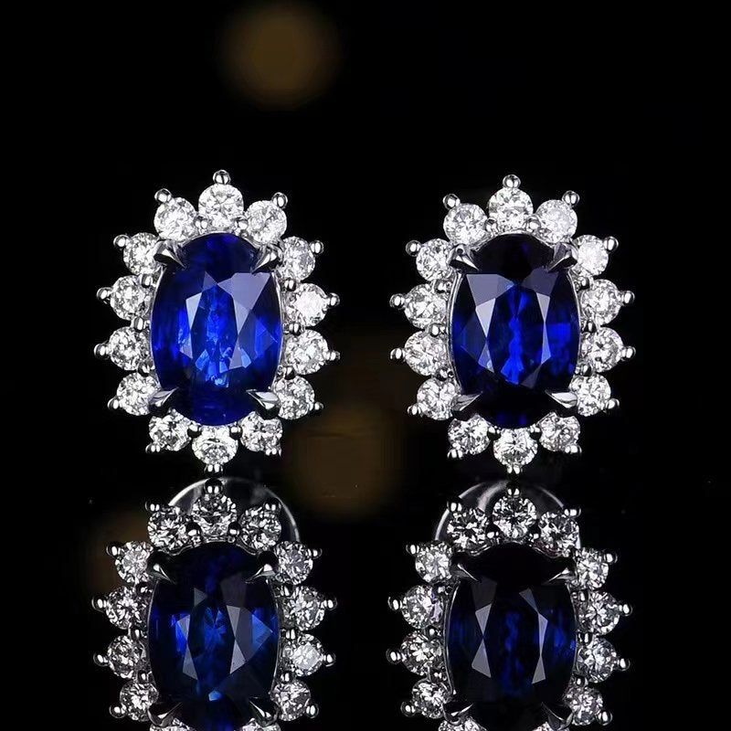Cometa Earrings in 18K gold with natural sapphire