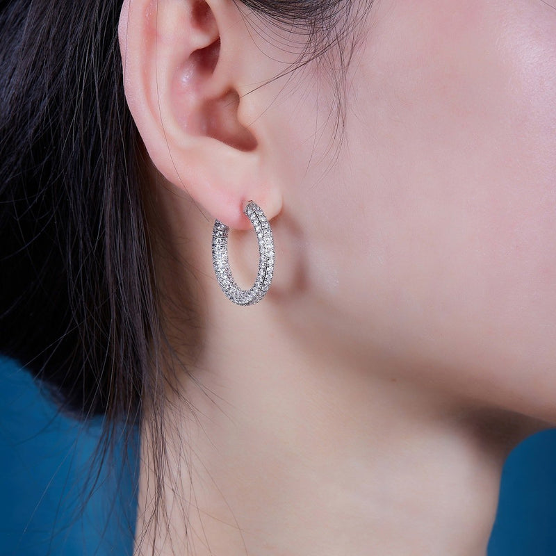 Oriana Earrings in sterling silver with moissanite
